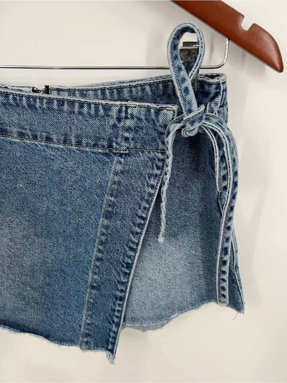 Free People Emmy Denim Faux Wrap Mini Skort with Side Tie - Picture 4 of 12